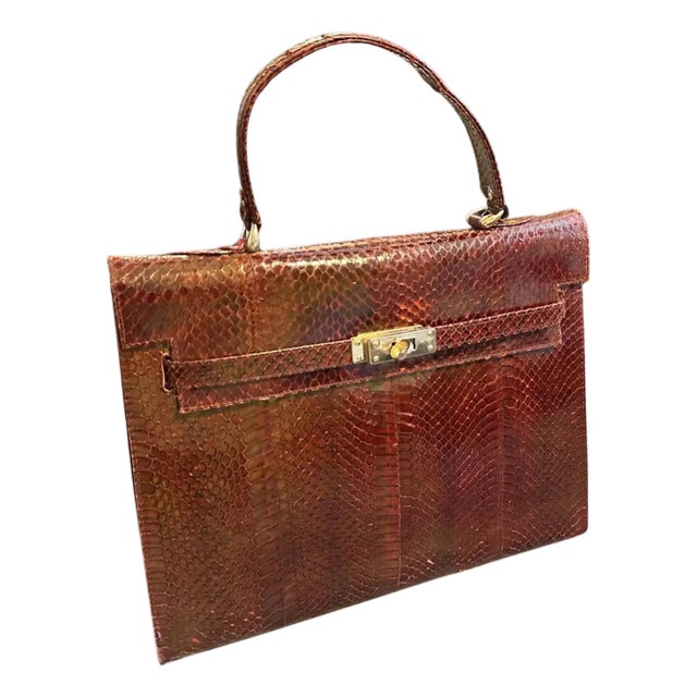 An Elegant 1970s Brown Leather and Brass Kelly Hand Bag For Sale