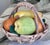 Life-like and in very good vintage condition, here is a ceramic majolica style basket of fruit made in Italy. Hand painted...