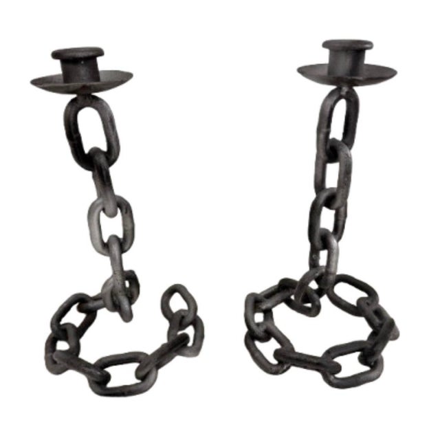 This vintage, handcrafted brutalist style iron chain link candle holder, featuring a rigid, welded illusion chain design....