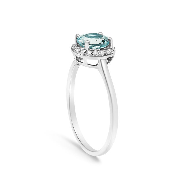 10K White Gold Blue Aquamarine and 1/10 Cttw Diamond Halo Ring For Sale - Image 4 of 7