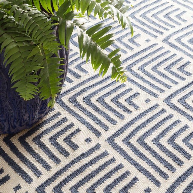 A traditional kilim weave gets the indoor/outdoor treatment in eco-friendly recycled materials and a woof-worthy graphic...