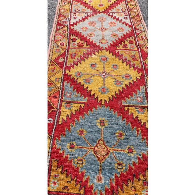Mid 20th Century Vintage Turkish Oushak Runner With Bold Gold, Red, and Sky Blue Medallions For Sale - Image 5 of 13