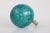 Lamp finial crafted from a large glass bubble in teal topping a knurled chrome swivel base. Handmade in the USA & fixed...