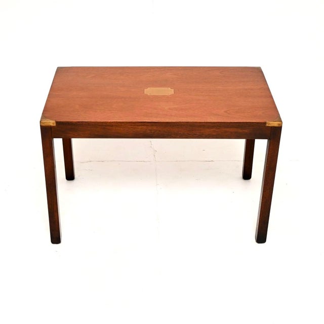 A lovely little antique military campaign style coffee table. This was made in England, it dates from around the 1930’s....