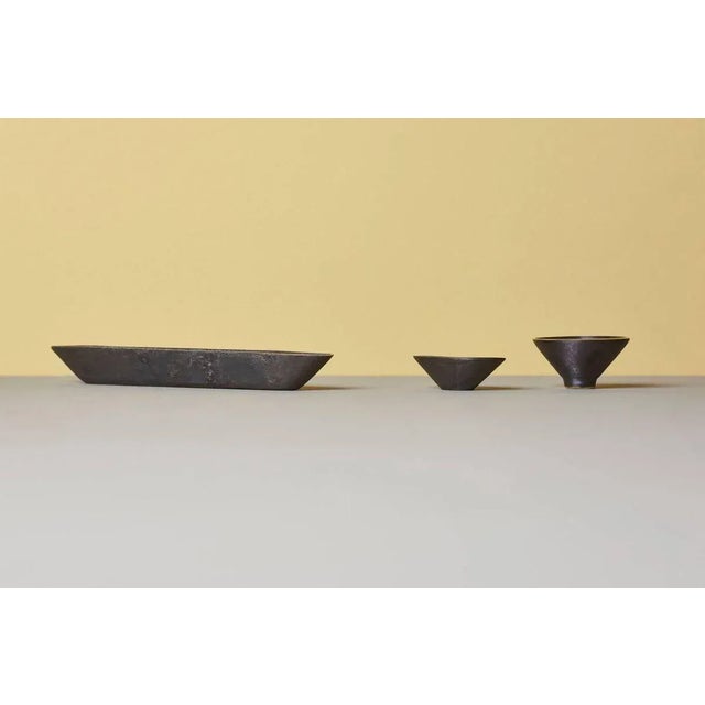 Set of three bowls by Carl Auböck #4279, #4280 and #4317 Measures: 28 cm x 5 cm x 3 cm 8 cm x 6 cm x 3 cm 4 cm x 7 cm...