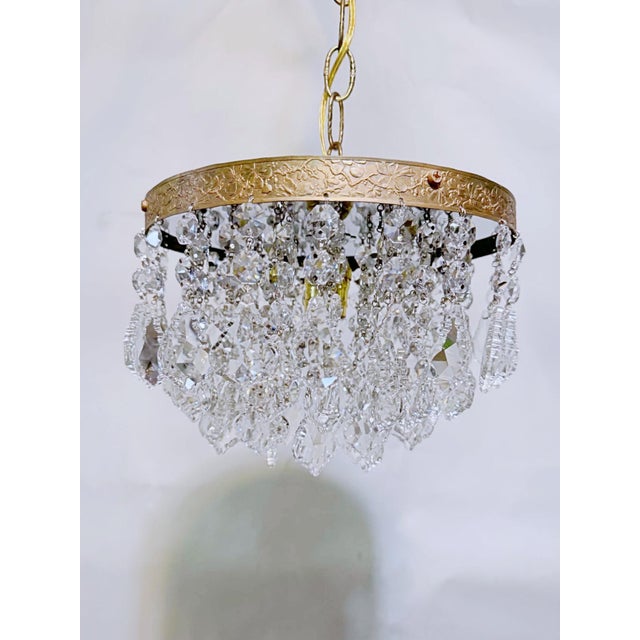 Bring a layer of classic European elegance and dynamic texture to your home with this exceptional vintage crystal basket...