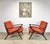 A pair of circa 1960’s Danish Modern style lounge chairs evocative of the Z Chair designed by Poul Jensen for Selig. These...
