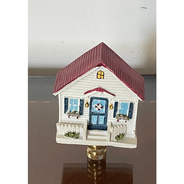 Cute Beach Cottage with red roof miniature on brass base as lamp finial. 2,5” by 2,5”.