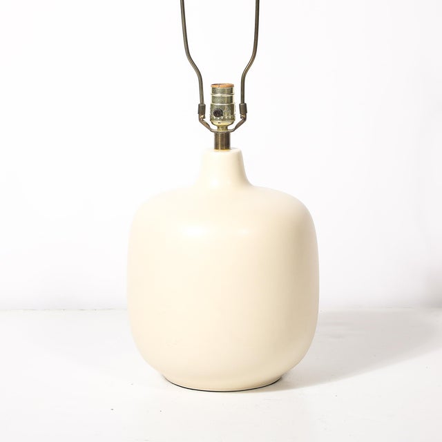 This stunning pair of mid-century modern ceramic table lamps epitomizes the refined Scandinavian design ethos championed...