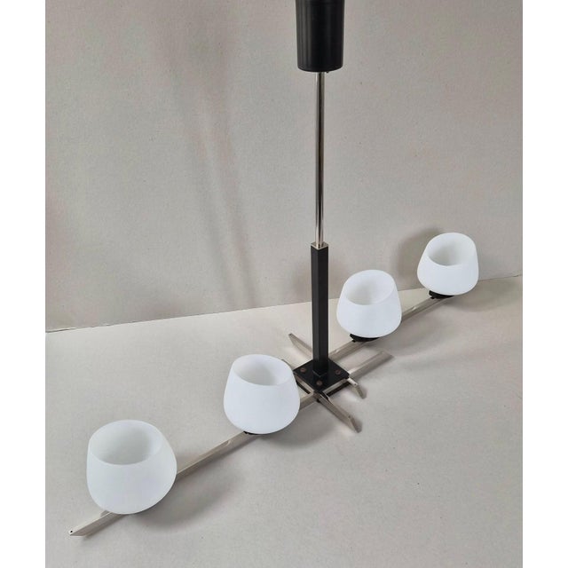 Very good overall condition. Working. Length 92 cm. Width 25 cm. Height 60 cm. A magnificent vintage chandelier. This...