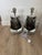 A pair of artisanal hand-blown glass table lamps by the renowned British studio Porta Romana. These "Obsidian" or smoke-...