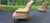 Pair of transitional style club chairs by Ethan Allen, manufactured in 1990s. Fully upholstered in leather with tufted...