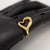 Preowned Tiffany & Co. Elsa Peretti Open Heart Ring crafted in 18k yellow gold Ring Size: 5.75 Approximate Weight: Gross -...