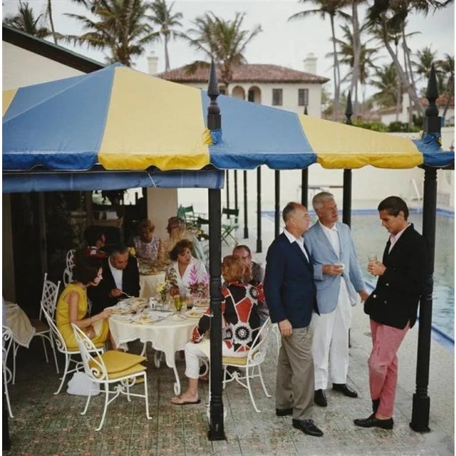 Palm Beach Party 1964 by Slim Aarons Slim Aarons Limited Estate Edition A pool party in Palm Beach, Florida, USA, 1964....