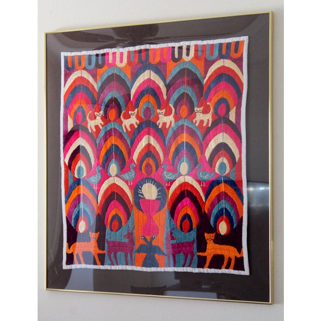 An exceptionally rare and culturally significant piece of authentic Maya folk art from Patzún, Guatemala. This framed...
