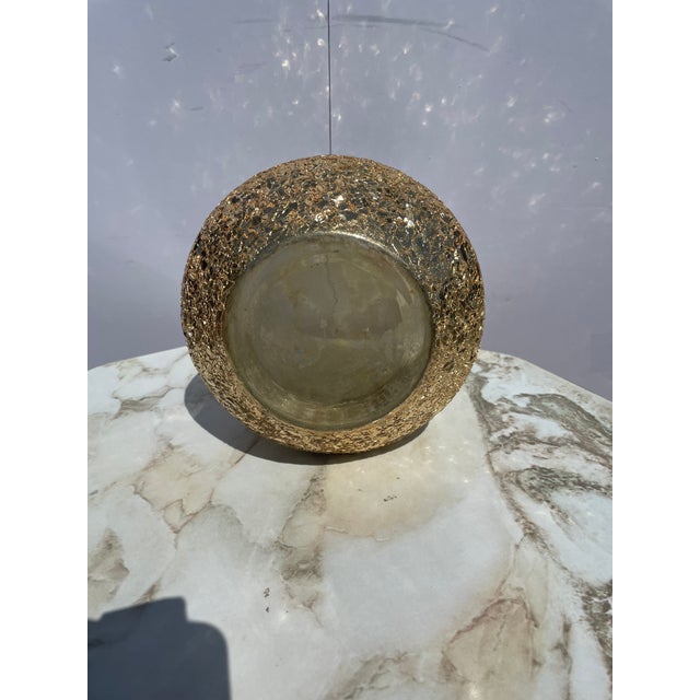 Here we have a vintage rough/chipped painted gold flake glass vase. Looks amazing when the light hits it. Beautiful piece..