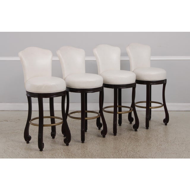 Age: Approx: 20 Years Old Details: Continental Style Scrolled Legs w. Carvings Textured White Leather Revolving Seats...