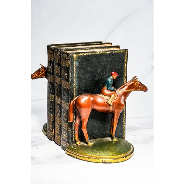 Step into the refined world of early 20th-century sporting decor with this charming pair of antique cold painted bronze...