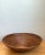 Constructed with finely wrapped natural pencil reed in an expansive 20-inch round silhouette, this vintage decorative...