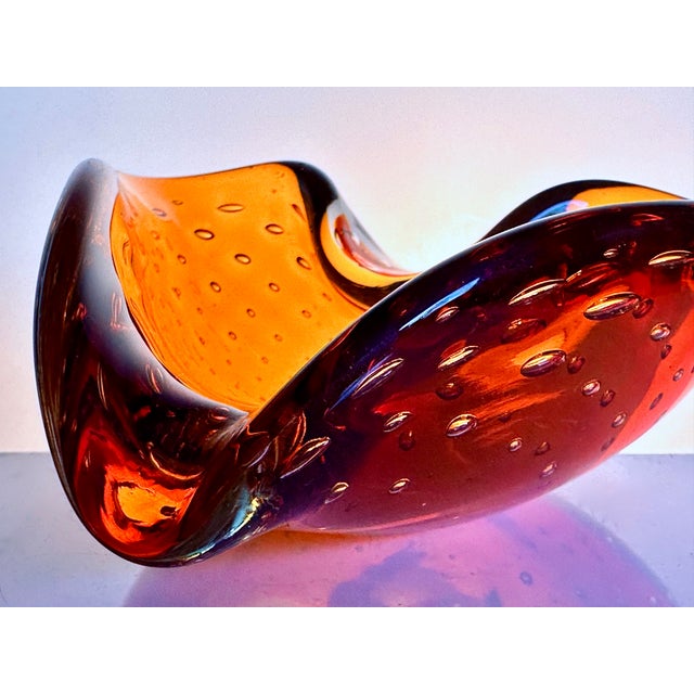 A small sculptural Murano glass bowl or ashtray by designer and glass artist Carlo Scarpa for Venini, Italy, dating to the...
