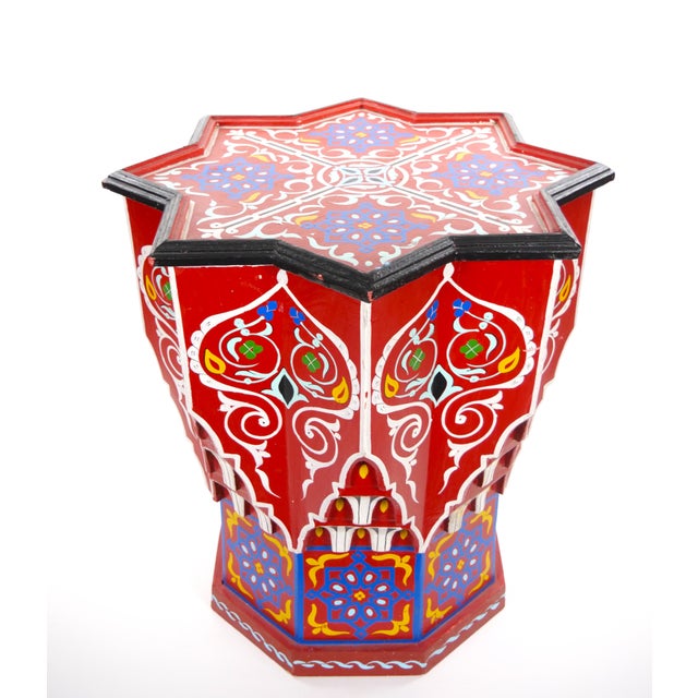 This highly decorative Moroccan side table is distinguished by its sculptural eight-pointed star-shaped top, architectural...