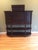 The sideboard cleverly incorporates a bar inside its cabinets. The false drawer fronts on its curved sides to expose three...