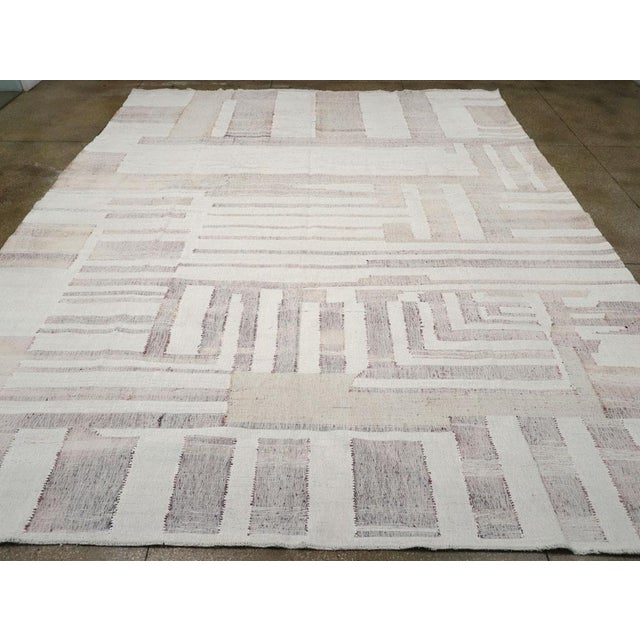 A vintage Turkish Flatweave Kilim large room size carpet handmade during the Mid-20th century. Measures: 12' 10" x 15' 9"
