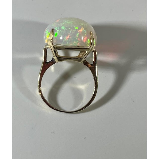 14 Carat Oval Shape Ethiopian Opal Cocktail Ring 14 Karat Yellow Gold For Sale - Image 10 of 18