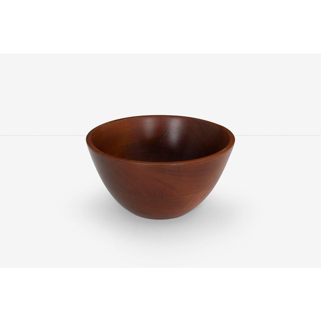 Arthur Espenet Carpenter Teak Bowl with Utensils, 1957 United States, circa 1950s A finely hand-turned teak bowl by...