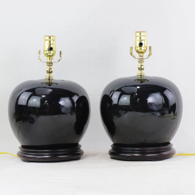 Chinese A Pair Early 20th Century Black Monochrome Porcelain Watermelon Jar Table Lamps on Carved Wood Bases For Sale - Image 3 of 15