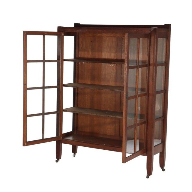 Antique Stickley School Arts & Crafts Mission Oak 2-Door Bookcase c1920 Measures - 61 3/4" x 46 1/8" x 14 3/4" An antique...