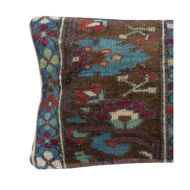 Add a touch of history and warmth to your space with this vintage handmade Turkish wool rug cushion cover. Crafted from...