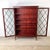 The diamond lattice glazed bookcase is one of the most enduring and visually satisfying forms in the English furniture...