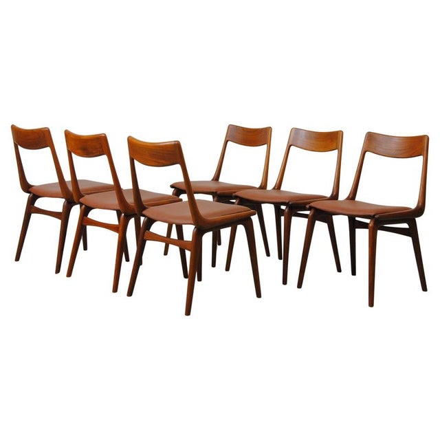Set of six Fully restored 1950s Danish boomerang dining chairs in teak by Alfred Christensen for Slagelse Møbelfabrik. The...