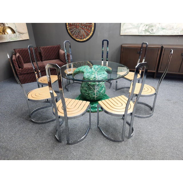 Set of 8 dining chairs by Allmilmö. These chairs were distributed by LÜBKE. An elegantly designed model from the 1980s....