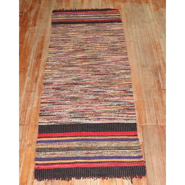 United States, Early 20th Century A rare silk and wool American Rag rug Runne with a polychrome striated line pattern...