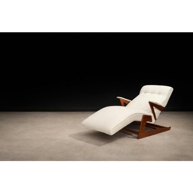 This sculptural chaise lounge stands as a striking example of Brazilian Modern design from the 1950s, a period defined by...