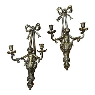 Pair of Early 20th Century Brass Cherub Putti Wall Sconces With Bow For Sale