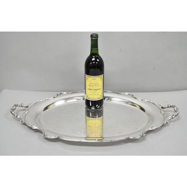 Vintage 1847 Rogers Bros "Reflection" Silver Plated Oval Serving Platter Tray. Circa Mid 20th Century. Measurements: 1.5"...