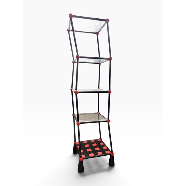 Iconic 1970s Space Age fully functional “Dancing Shelf” / “Wiggly Shelf,” featuring a sculptural black tubular-steel...