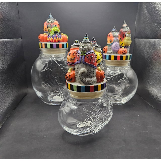 This marvelous set of 3 Fitz & Floyd Halloween canisters are created in gorgeous pressed glass which are topped with...