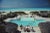 The Meridian Club 1981 by Slim Aarons Slim Aarons Limited Estate Edition The pool at the Meridian Club, owned by Ginny and...