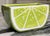 Bring some summer color to your next occasion with this vintage lime motif vessel. Displays as functional art, useful as a...