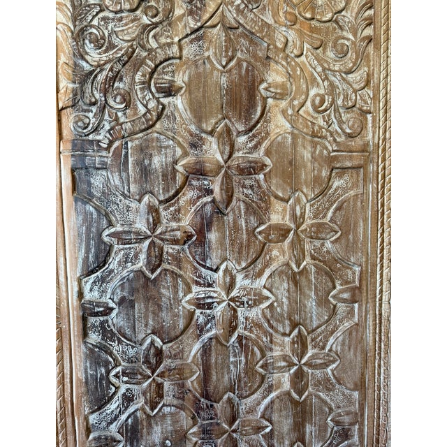 Make a bold, soulful statement with these rustic vintage carved wooden doors, beautifully adorned with intricate floral...