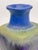 A beautiful drip glazed pottery vessel by Fantoni. It has a squarish shaped base with a round top. A stunning deep shade...