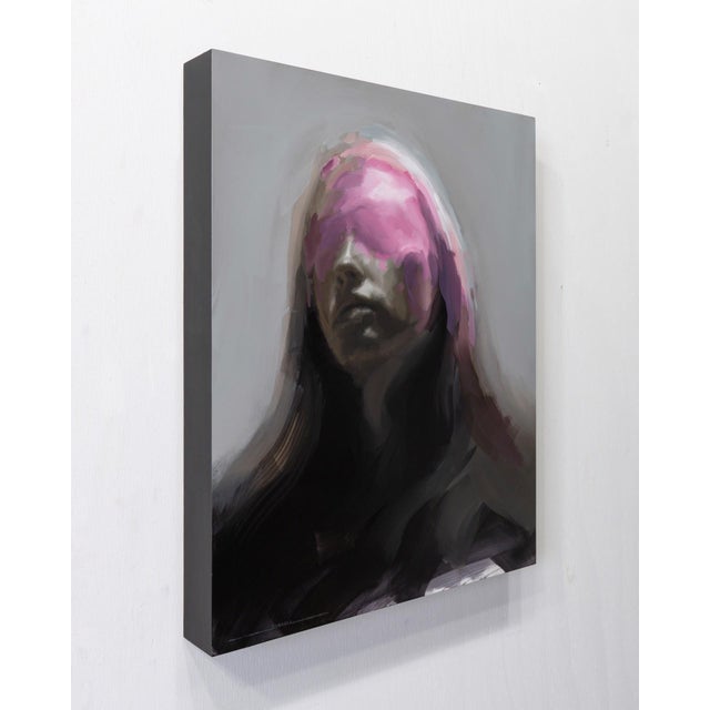Reflect presents a contemplative figure shrouded in muted greys and deep shadows, with a striking splash of pink across...