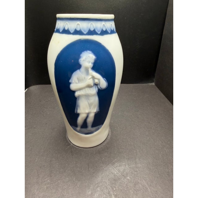 pâte-sur-pâte porcelain cameo vase, a classic decorative ceramic method developed in France during the mid-19th century....