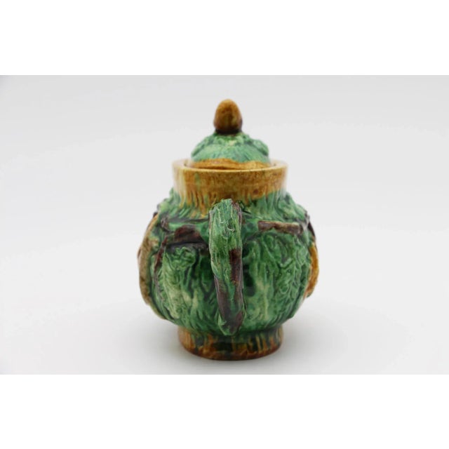 The potter who developed this Tea Pot depicting hunting scenes was Herculano Elias (1884-1939). He was a worker at Fábrica...