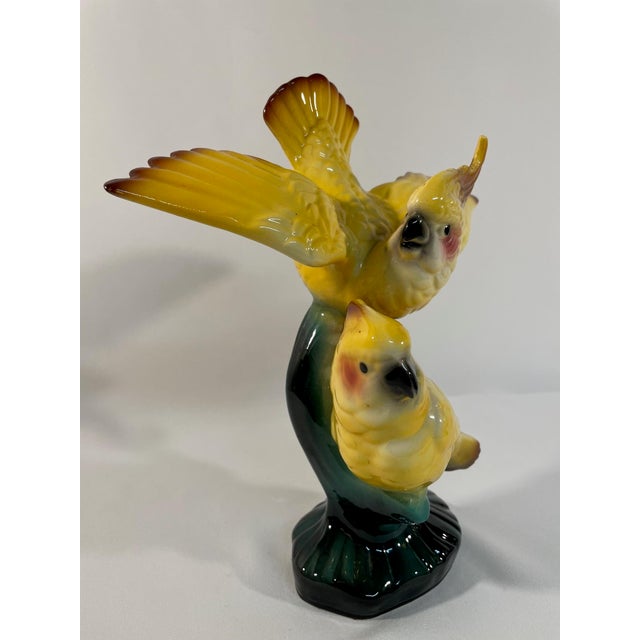 A distinctive Mid Century Modern designed pair of Ceramic Cockatoos Figurine, c. 1940s-1950s. No markings although it...