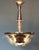 This round Art Deco chandelier in nickel-plated brass resembles models from the Petitot company. The five vertical,...